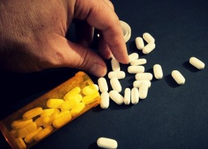 Taking Narcotic Pills, a leading prescription drug that is abused.