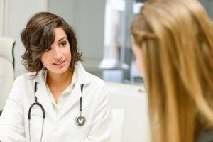 Doctor explaining diagnosis to her female patient